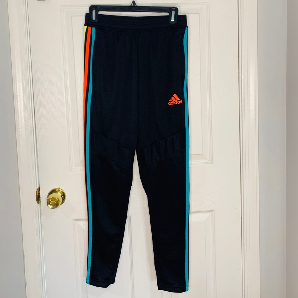 Adidas track pants with neon stripes and mesh